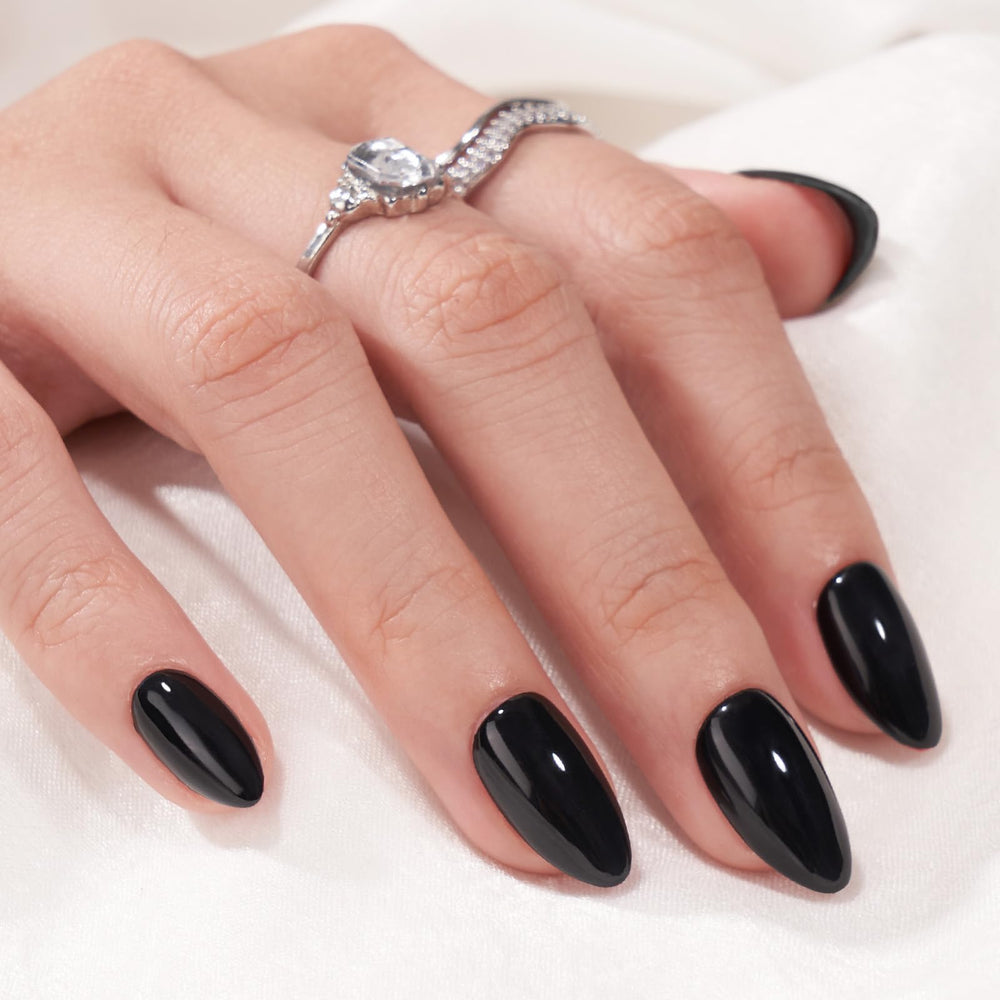 BTArtbox Black Velvet almond nails close-up with natural-looking finish.