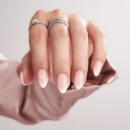 BTArtbox short almond French tip nails close-up for natural salon-like finish.