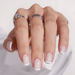 BTArtbox white French Tip nails demonstrates square shape for a salon-like finish.