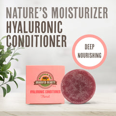 Buffalo Gal conditioning bar in hand showing portable hydration and easy application.