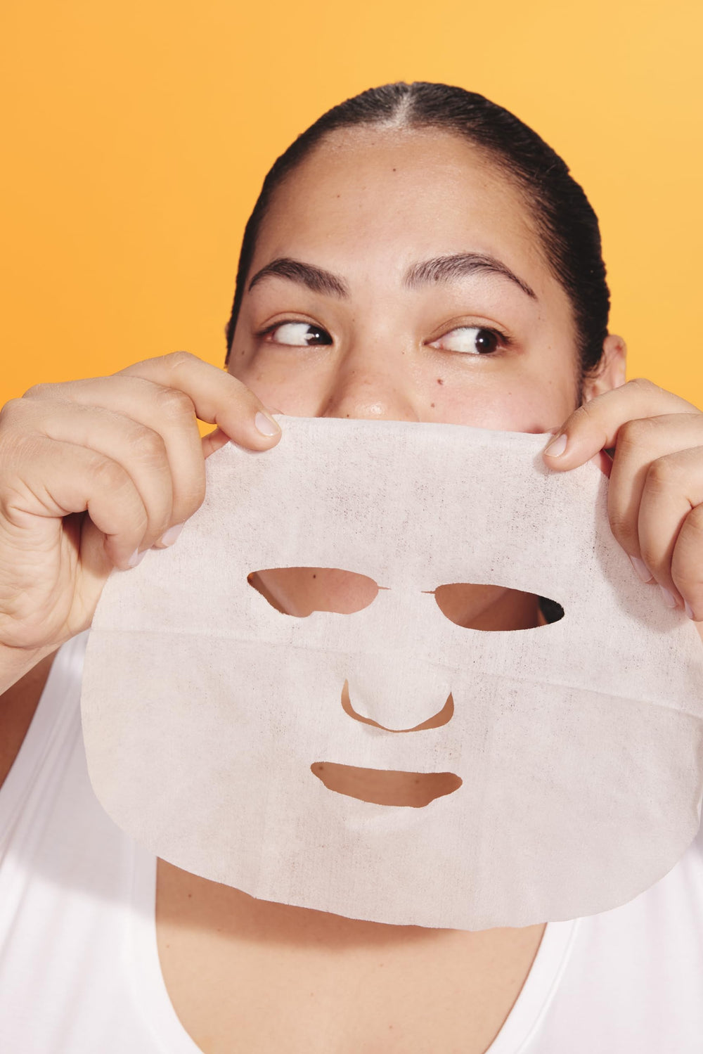 Rose and algae ingredients highlighted on Burt's Bees mask for antioxidant nourishment