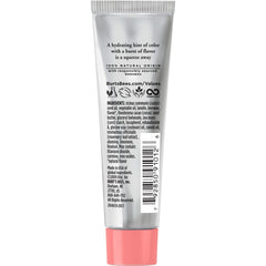 Burt's Bees lip balm on lips with light peach tint and shine