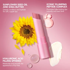 Lips wearing Coral Crush lip glow balm with nourishing shine and comfort.