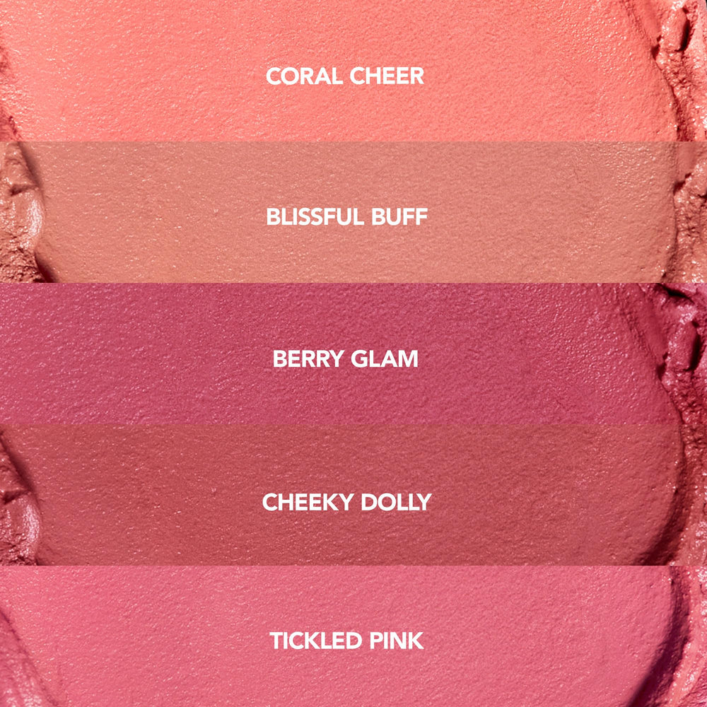 Swatch of Coral Sheer on skin demonstrates buildable color payoff