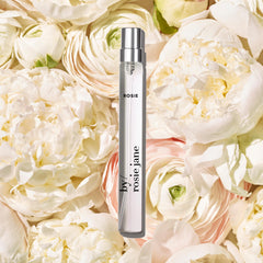 By Rosie Jane Rosie travel perfume bottle close-up with rose detail.