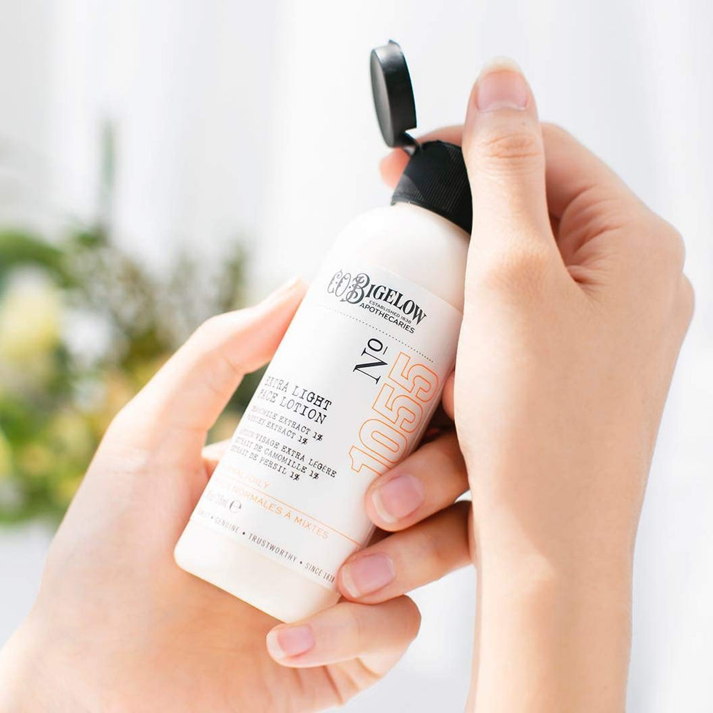 C.O. Bigelow Extra Light Face Lotion ingredients label highlighting soothing aloe and chamomile.