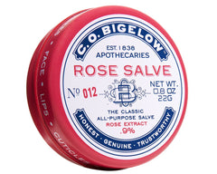 Close-up of C.O. Bigelow Rose Salve applying on dry lips for relief.