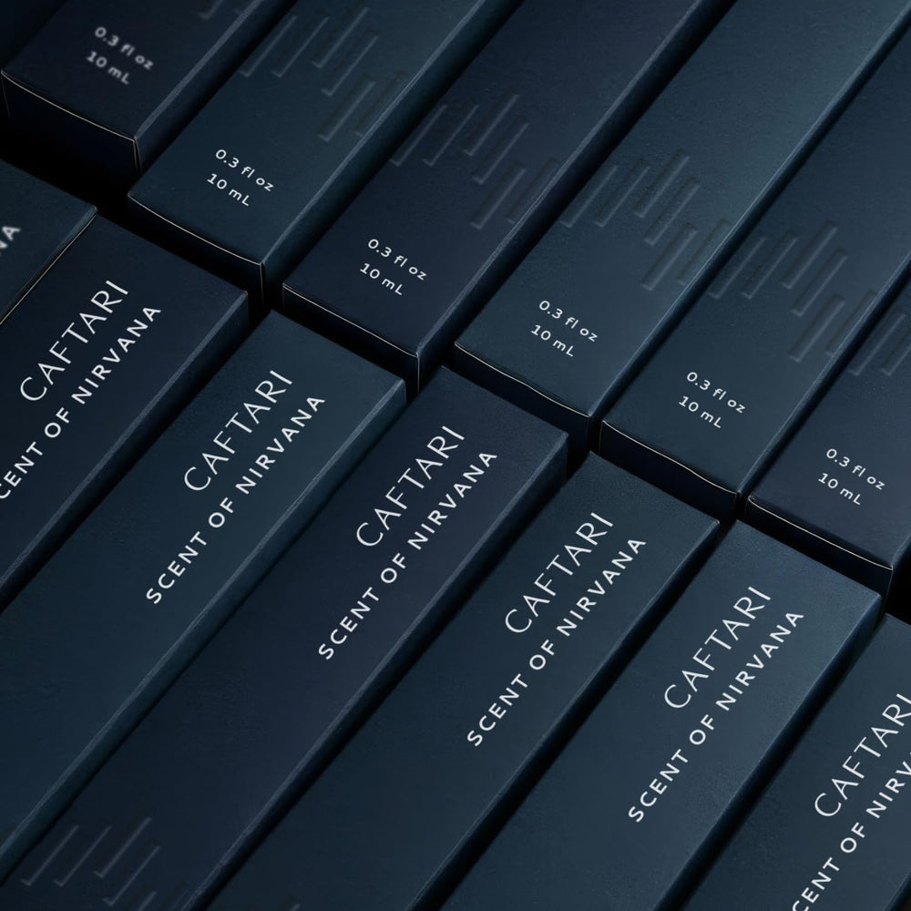 Caftari travel-ready-bottle-packaging for convenient scent touch-ups.