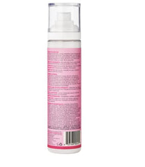 Cake Beauty Curl Reviving Spray application mist smooths flyaways and boosts bounce.