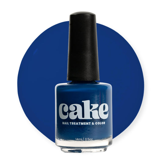 CAKE Nail Anchor Down navy blue polish bottle shows rich color and long-lasting finish.