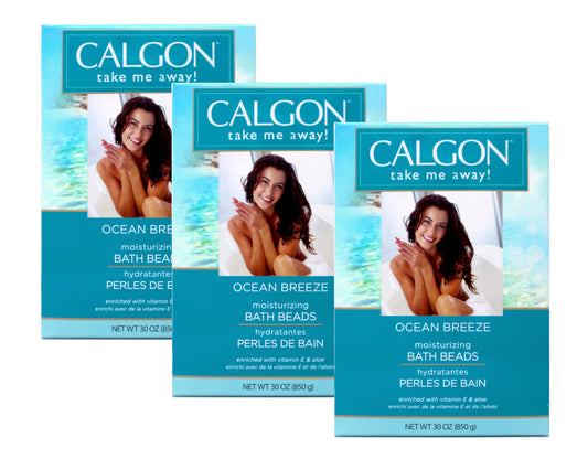 Calgon Ocean Breeze bath beads poured into water for a soothing moisturizing soak.