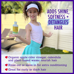 California Baby Calendula Kids Conditioner applying to damp hair for detangling.