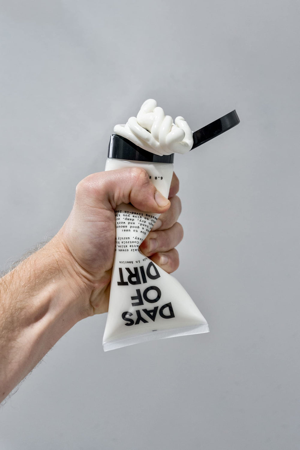 Travel-friendly Days of Dirt tube ready for on-the-go styling.