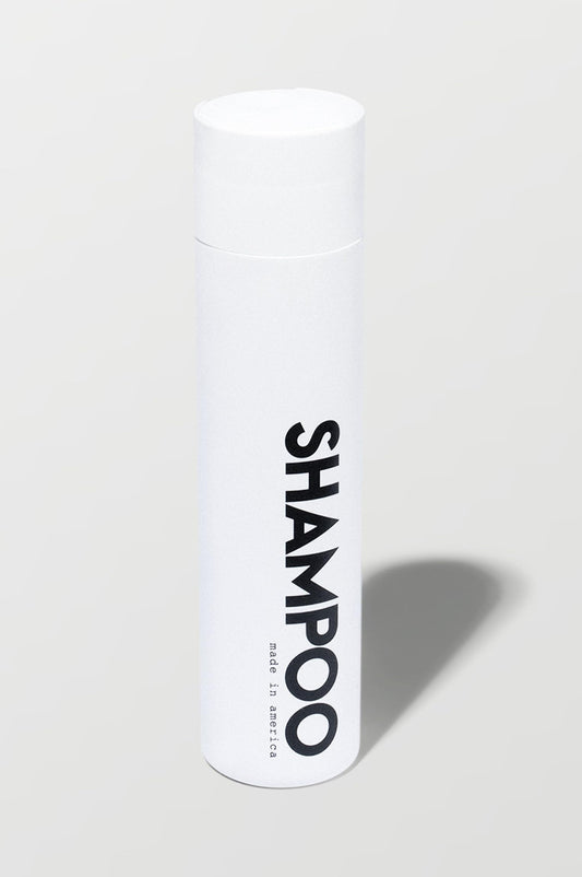 California Born sulfate-free shampoo bottle close-up with beachy coconut scent for all hair types