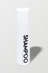 California Born sulfate-free shampoo bottle close-up with beachy coconut scent for all hair types