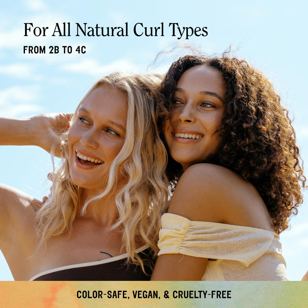 California Naturals Dream Curl shampoo in use with creamy lather on curls