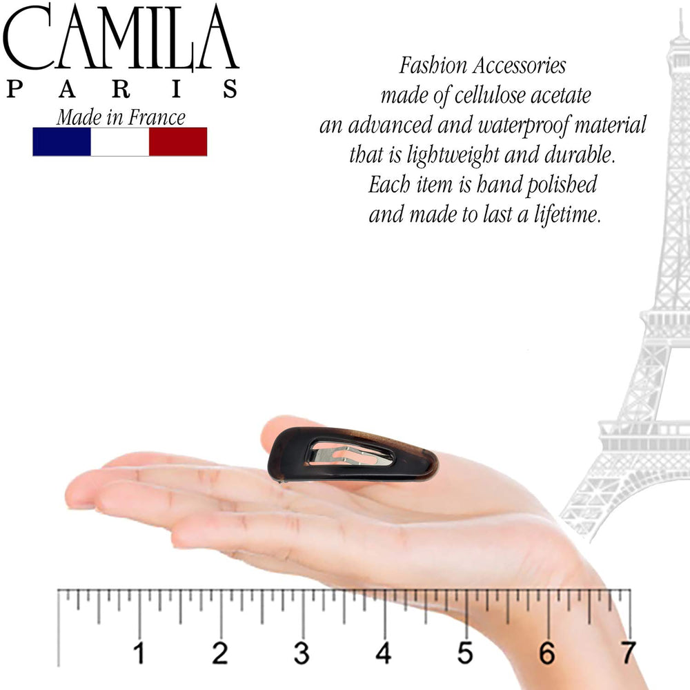 Camila Paris AD86/2 tortoise barrette securing a hair section during styling.