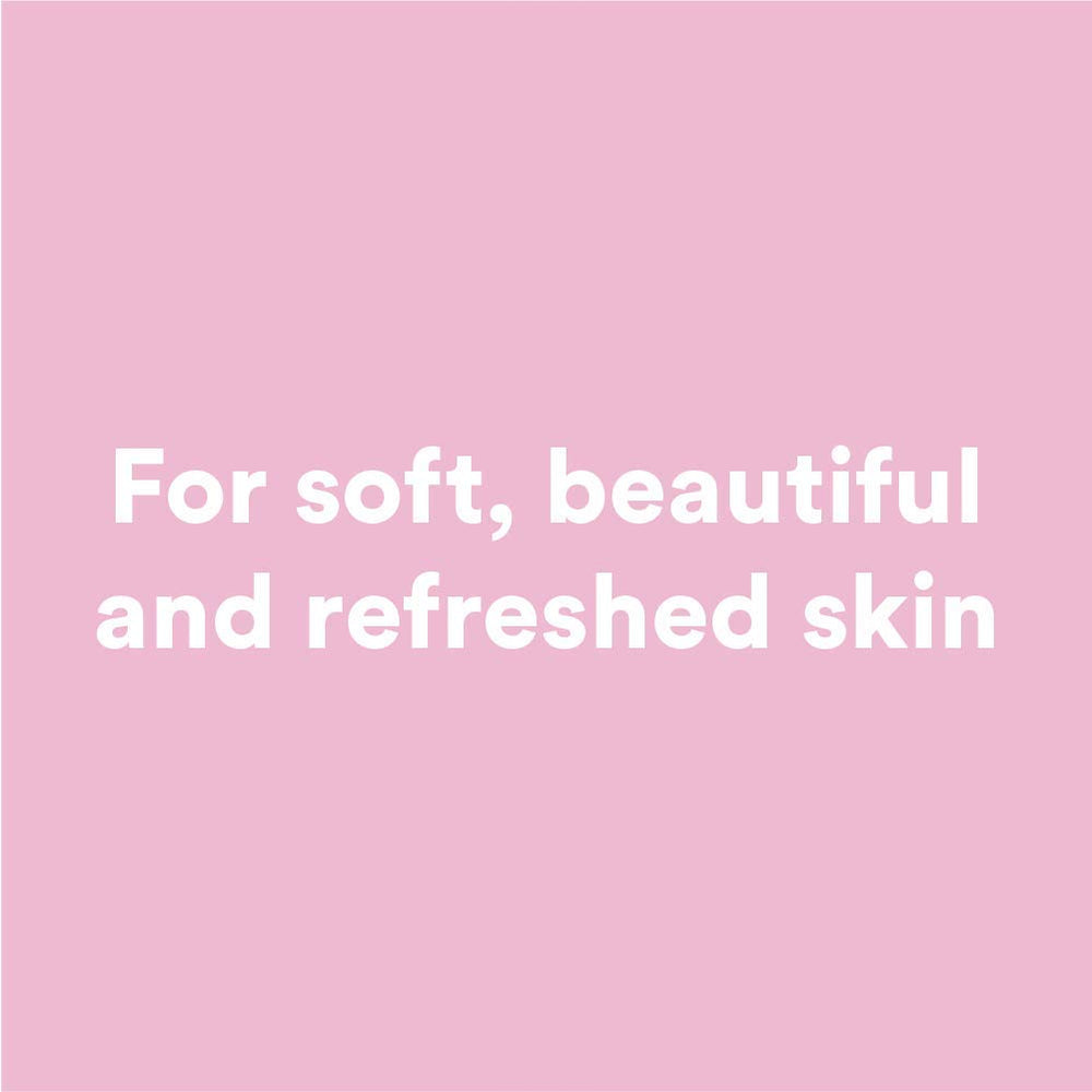 Hands lathering with Camille Beckman glycerine rosewater bar soap for gentle cleansing.