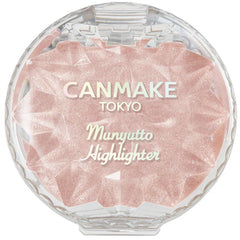 CANMAKE Munyutto Highlighter shows squishy texture for a dewy glow.