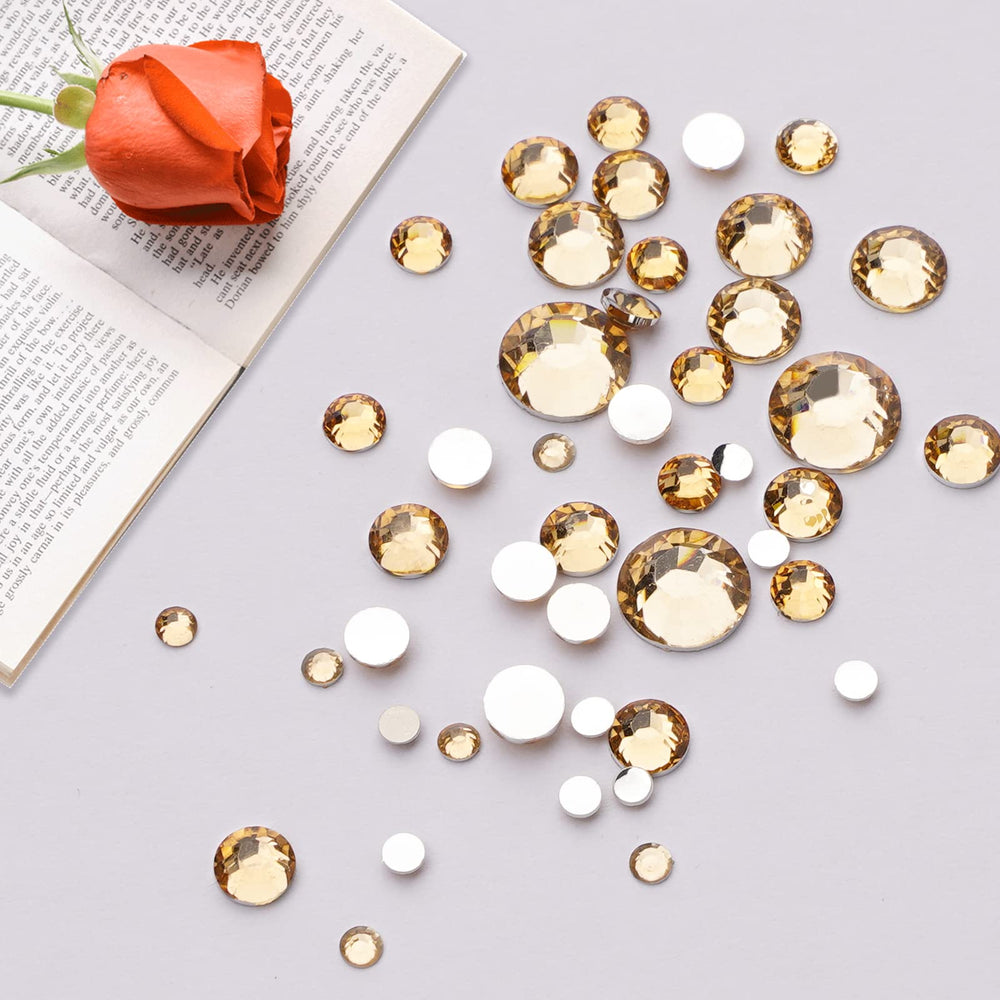 Canvalite 12 styles nail gems spread for easy color and shape matching.