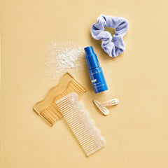 Capri Blue Volcano powder spray at roots adds texture.