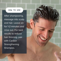 Cardon Hair Growth Conditioner application on hands during routine.