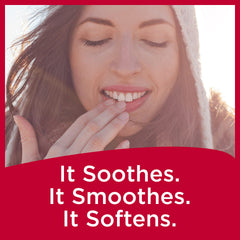 Carmex strawberry lip balm close-up showing a smooth, easy-to-apply texture