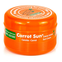 Carrot Sun tanning accelerator bottle pour for even coverage during sun exposure.