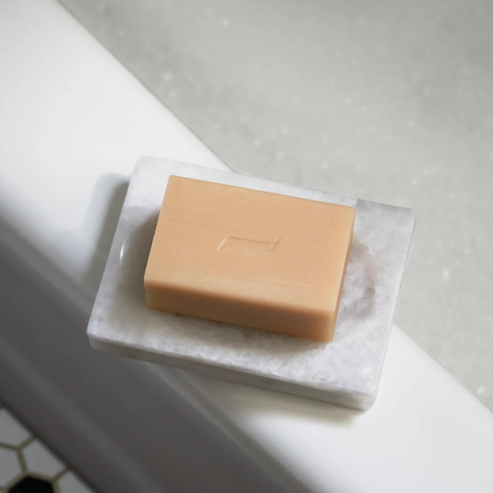 Caswell-Massey oatmeal castile bar highlights plant-based formula for sensitive skin.