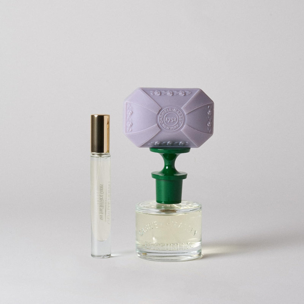 Caswell-Massey Orchid Perfume Spray vial emphasizing compact travel size for on-the-go wear