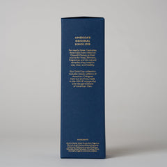 Gift-ready Caswell-Massey Woodgrain Sandalwood bottle in elegant packaging