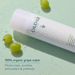 Mist dispersing on the face for instant cooling and moisture.