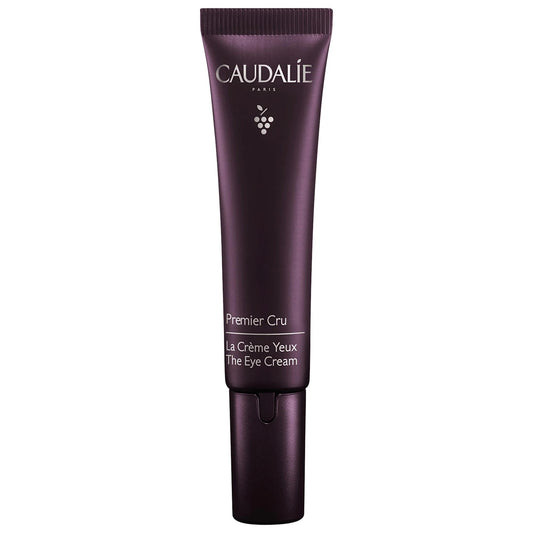 Caudalie Premier Cru eye cream application close-up smoothing the eye area