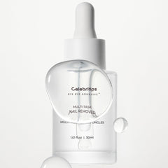 Applying Celebritips Bye Bye Adhesive remover for safe nail cleanup.