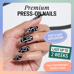 Chillhouse Creepy Baby Almond Tips on nails for Halloween-inspired style.
