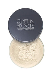 Cinema Secrets Ultralucent Setting Powder soft light close-up for a smooth, matte finish.