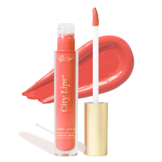 City Beauty City Lips Coral Sunrise gloss delivers a glossy, fuller look.