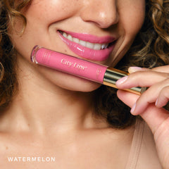 City Beauty City Lips Watermelon gloss tingling sensation signals plump look.