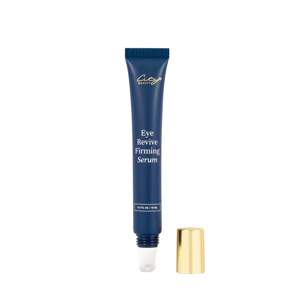 City Beauty Eye Revive Serum packaging beside glass bottle and pump.