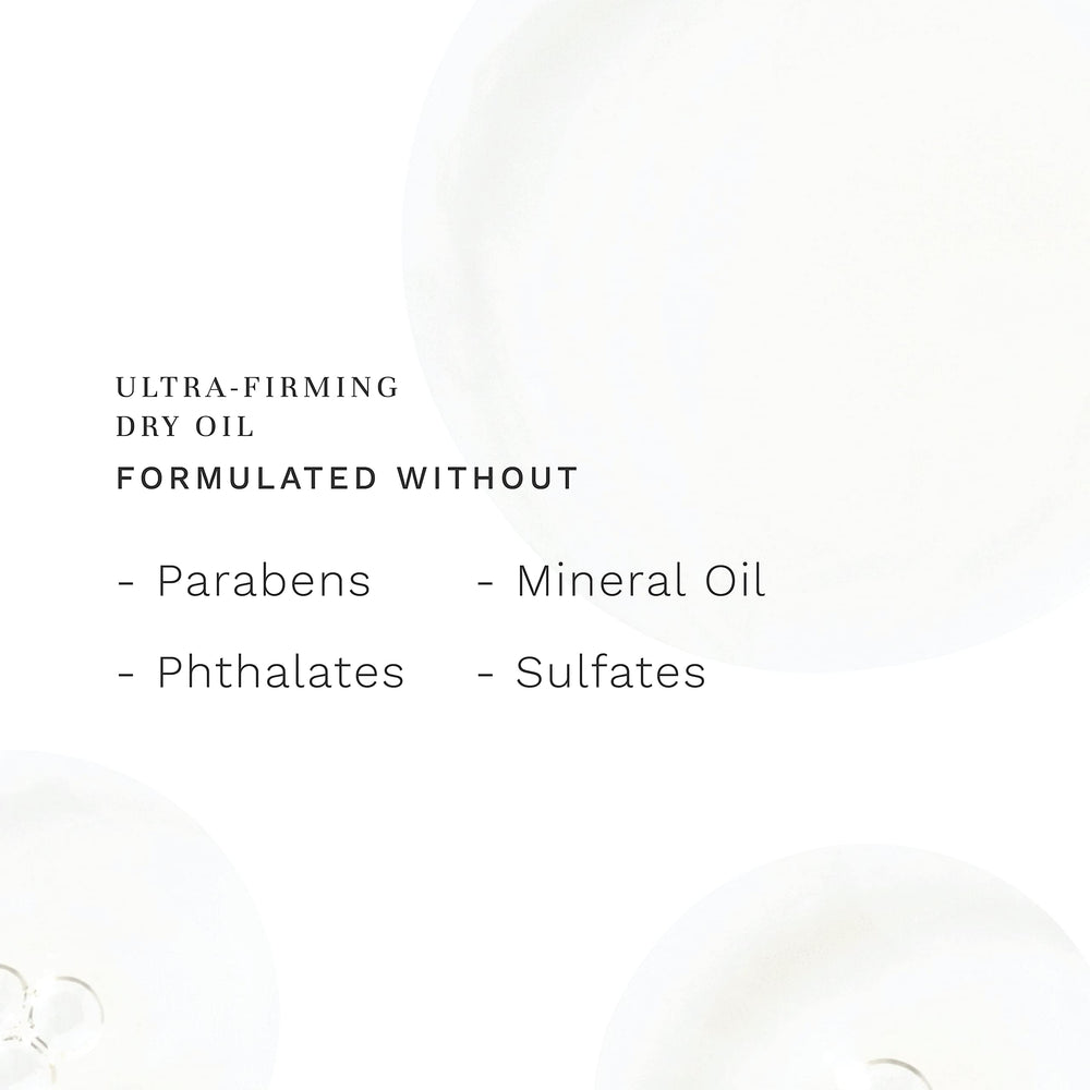 City Beauty Ultra-Firming Dry Oil texture on skin near collarbone