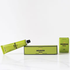 Claus Porto Musgo Real soap lather shows rich creamy foam for skin care.