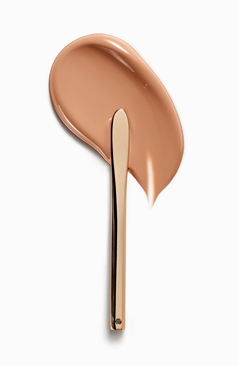 Clé de Peau Beauté Foundation application demonstrates seamless, buildable coverage.