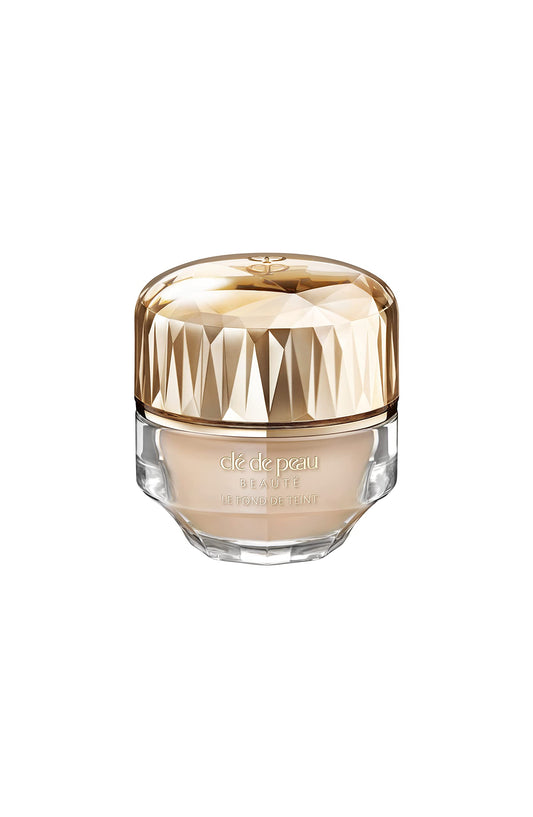 Clé de Peau Beauté foundation bottle shows SPF 22 and luxe texture for a radiant finish