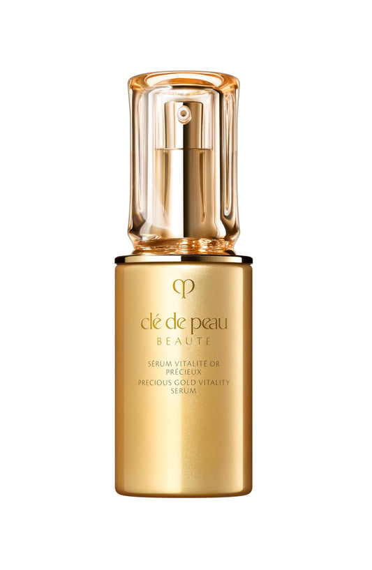 Clé de Peau Beauté Precious Gold Vitality Serum bottle for radiant daily skincare.