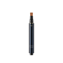 Clé de Peau Beauté Radiant Corrector for Eyes Toffee bottle glides on smoothly for brighter under-eye area.
