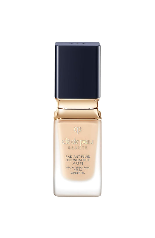 Cle de Peau Beauté Radiant Fluid Foundation O10 bottle shows matte finish and skincare benefits