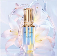 User applying The Serum to face with gentle pressure