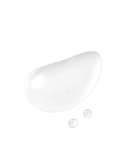 Dropper dispensing serum from Clé de Peau Beauté bottle.