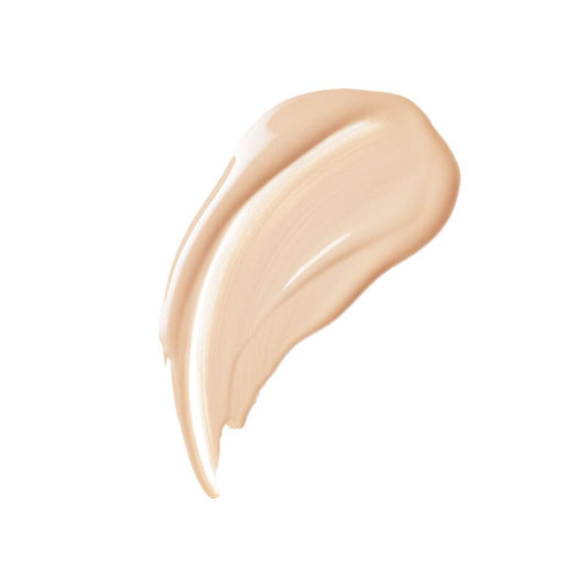 Clé de Peau Radiant Fluid Foundation swirl application shows buildable coverage.