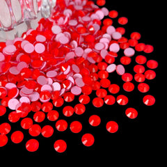 CLEKSPOYE tumblers and accessories shine with neon red rhinestones.